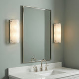 Kira Wall Sconce 13" tall shown in bathroom with nickel hardware and light green walls