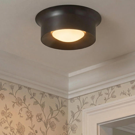 Jonah LED Flush Mount 14", Bronze geometric flush mount in a Traditional Hallway with floral wallpaper and white crown molding.