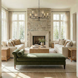Adalyn 6 Light Chandelier 31", Antique Iron linear Chandelier in a Modern Farmhouse Living Room with a green velvet chaise.