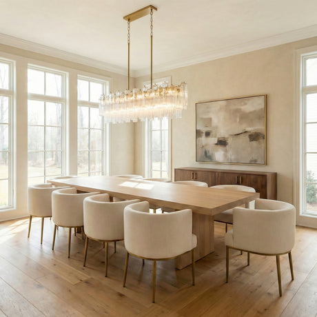 Grace Linear Chandelier 52", Brass with Clear Glass linear chandelier in a Transitional Dining Room with a light oak table.