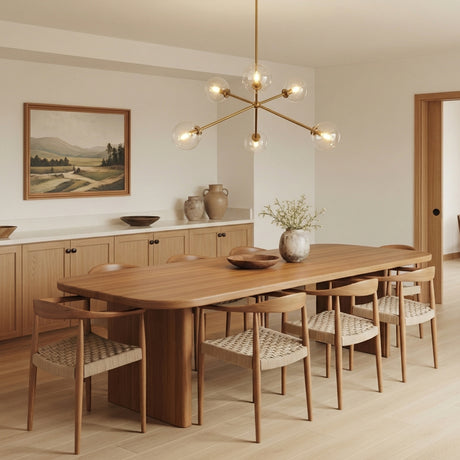 Gurt 6 Light Chandelier 40", Aged Brass geometric chandelier in a Modern Dining Room with a light wood dining table.