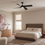 A transitional bedroom features a Largo LED Ceiling Fan 56", Matte Black in the ceiling center above a beige upholstered bed and a natural wood dresser.