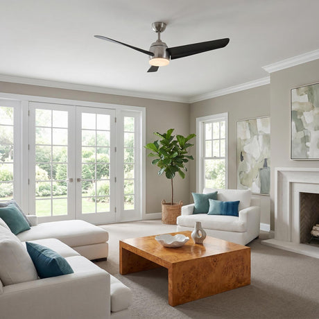 A transitional living room with the Lorain LED Ceiling Fan in brushed nickel and matte black mounted above a burl wood coffee table and white sofas.