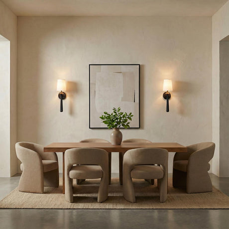 Sabina Wall Sconce 18", Matte Black linear Wall Sconce in a Modern Dining Room with organic upholstered dining chairs.