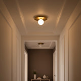 Sol LED Flush Mount 10", Brushed Brass for Modern home with Cream Walls