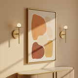 Sol LED Wall Sconce 10", Brushed Brass for Modern home with Beige Walls