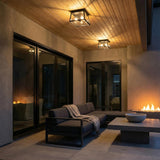 Alden Outdoor Flush Mount, Black geometric Outdoor Flush Mount in a Modern Farmhouse Outdoor with a charcoal sectional and fire pit.