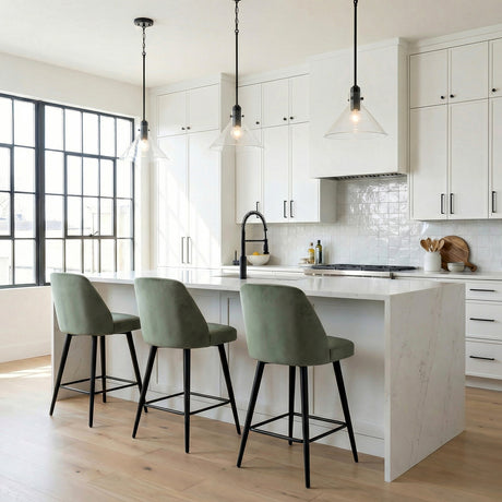 Nash Pendant 14”, Matte Black geometric Pendant in a Modern Kitchen with a white marble island and green velvet stools.
