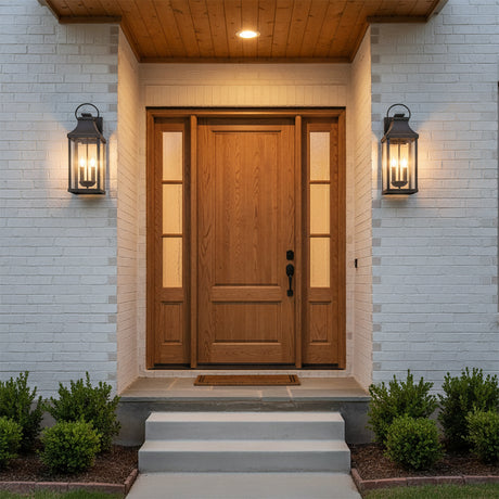 Ainsley Outdoor Wall Light, Medium 21" Oiled Bronze - Front entrance with two bronze lanterns