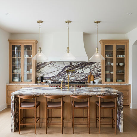 Nash Pendant 14”, Aged Brass geometric pendant lights in a Transitional Kitchen with a purple marble island.