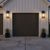 Chester Outdoor Wall Light, Medium 20" Black - Exterior of garage with two wall lights flanking a garage door