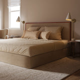 Cozy, large bedroom with two Avin Adjustable Wall Sconces in white next to the bed.