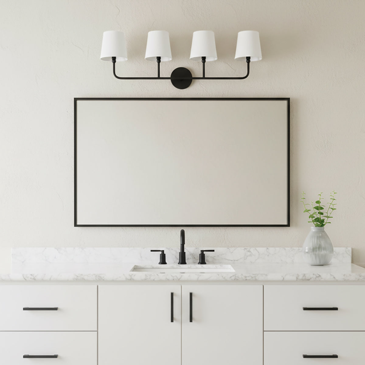 Elowen 4 Light Vanity Light, in Matte Black, shown above a single sink and wide horizontal mirror in a neutral decorated bathroom.