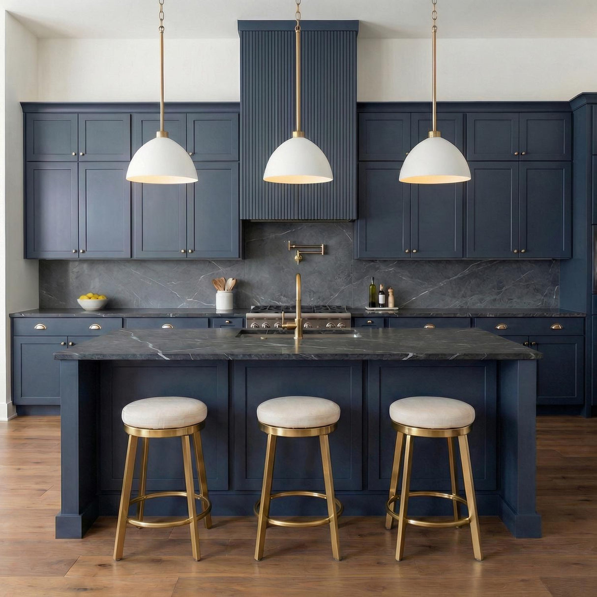 Cleo Pendant 13", White and Aged Brass geometric pendant in a Transitional Kitchen with navy cabinets and a marble island.