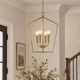 A transitional foyer with an aged brass lantern pendant suspended near a dark wood paneled door, neutral walls with crown molding, and a staircase.