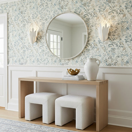 Textured White leaf design Wall Sconce in a Transitional Entryway with a light wood console table and beaded mirror.