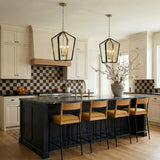 Talin Lantern Pendant, Black and Matte Brass geometric Pendant in a Modern Farmhouse Kitchen with a checkered backsplash.