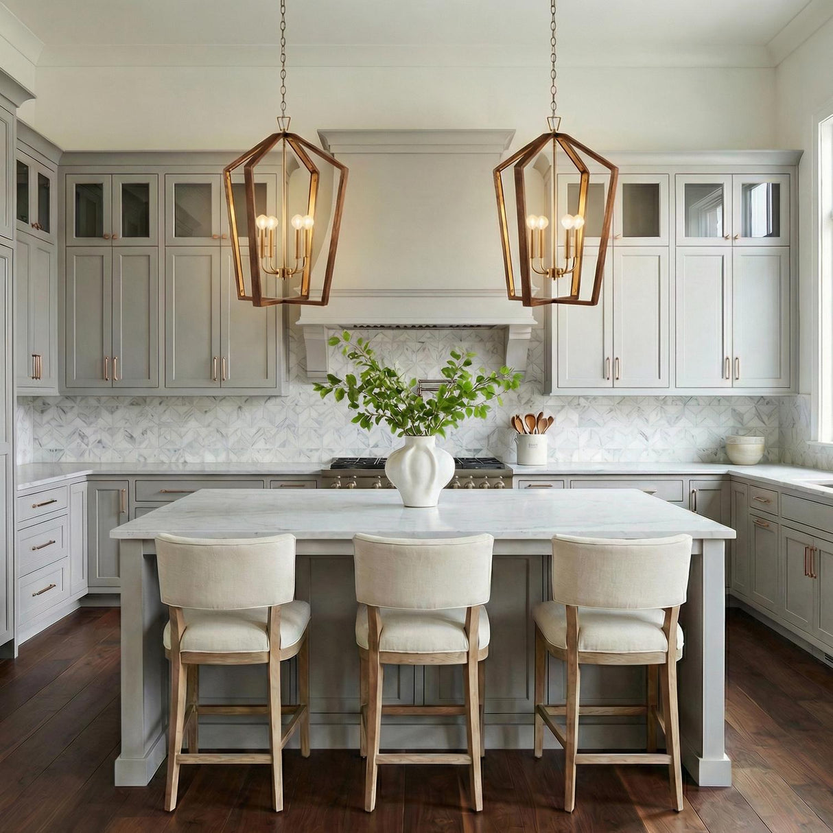 Talin Lantern Pendant 20", Chestnut and Matte Brass geometric Pendant in a Transitional Kitchen with a white marble island.