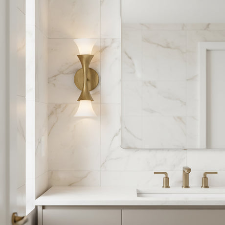 Modern bathroom interior with marble walls, a sink, and the Fleur 15" tall wall scone in textured brushed brass.