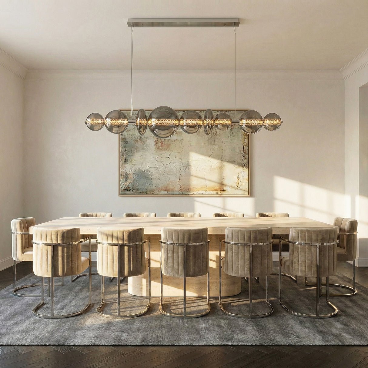 Elara LED 9 Light Linear Chandelier 74", Chrome and Smoke Glass globe Chandelier in a Contemporary Dining Room with a stone dining table.