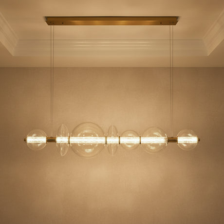 Elara LED 7 Light Linear Chandelier 56", Brass and Clear Glass for Modern home with Textured Beige Walls