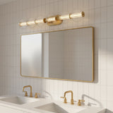 Elara LED 5 Light Vanity 38, Brass and Clear Glass - Vanity light above a double sink in a bathroom