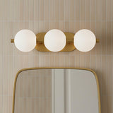 Nola LED 3 Light Vanity 23", Brass and Ribbed Opal Glass