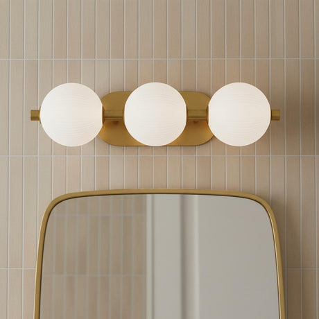 Nola LED 3 Light Vanity 23", Brass and Ribbed Opal Glass