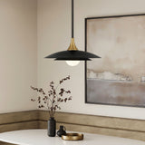 Yates modern pendant light 18" wide in black and brass in a modern dining nook.