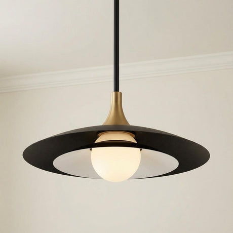 Matte Black and Brass geometric pendant in a Modern Dining Room with neutral walls and crown molding.