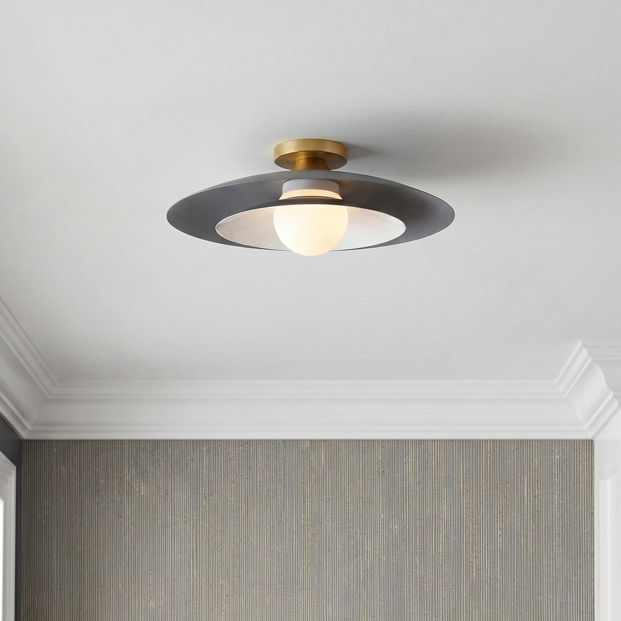 Yates LED Flush Mount 18", Matte Grey geometric globe Flush Mount in a Transitional Entryway with textured grey wallpaper.