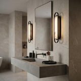 Inez LED Wall Sconce 24", Matte Black and Alabaster linear Wall Sconce in a Modern Bathroom with a floating concrete vanity.