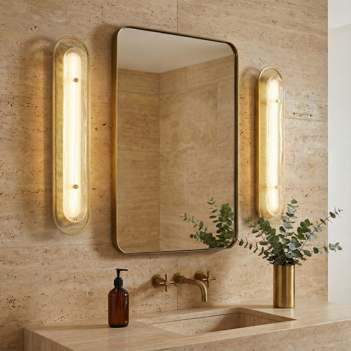 Vance LED Wall Sconce 30", Brass and Textured Glass styled in a Modern Bathroom with travertine tile.