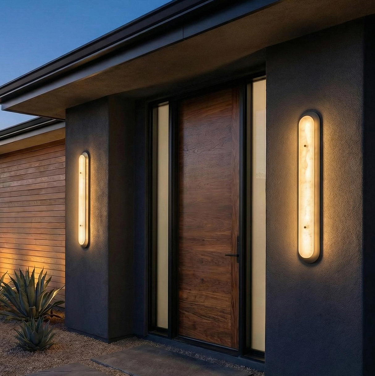 Vance LED Outdoor Wall Light 38", Black and Alabaster linear Outdoor Wall in a Modern Outdoor with a wooden front door.