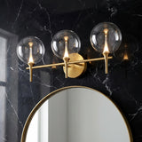 Eaton LED 3 Light Vanity, Brass and Clear Glass for Modern home with Black Marble