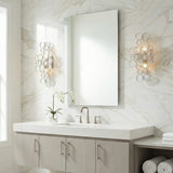 Denali Wall Sconce 18", Champagne Silver with Clear Glass geometric wall sconce in a Contemporary Bathroom with a white marble wall.