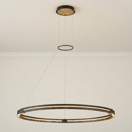 Brass and Black geometric Pendant in a Modern Living Room with clean walls and crown molding.