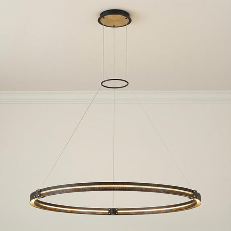 Brass and Black geometric Pendant in a Modern Living Room with clean walls and crown molding.