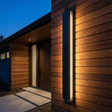 Rye LED Outdoor Wall Light 46", Textured Black for Modern home with Brown Wood Siding