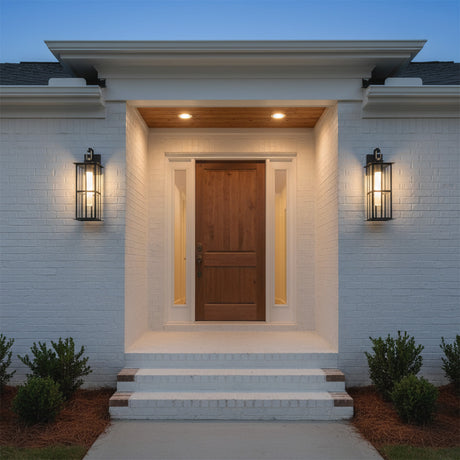 Portico LED Outdoor Wall Light 22", Black with Gold Accents - Two outdoor wall lights flanking a wooden front door