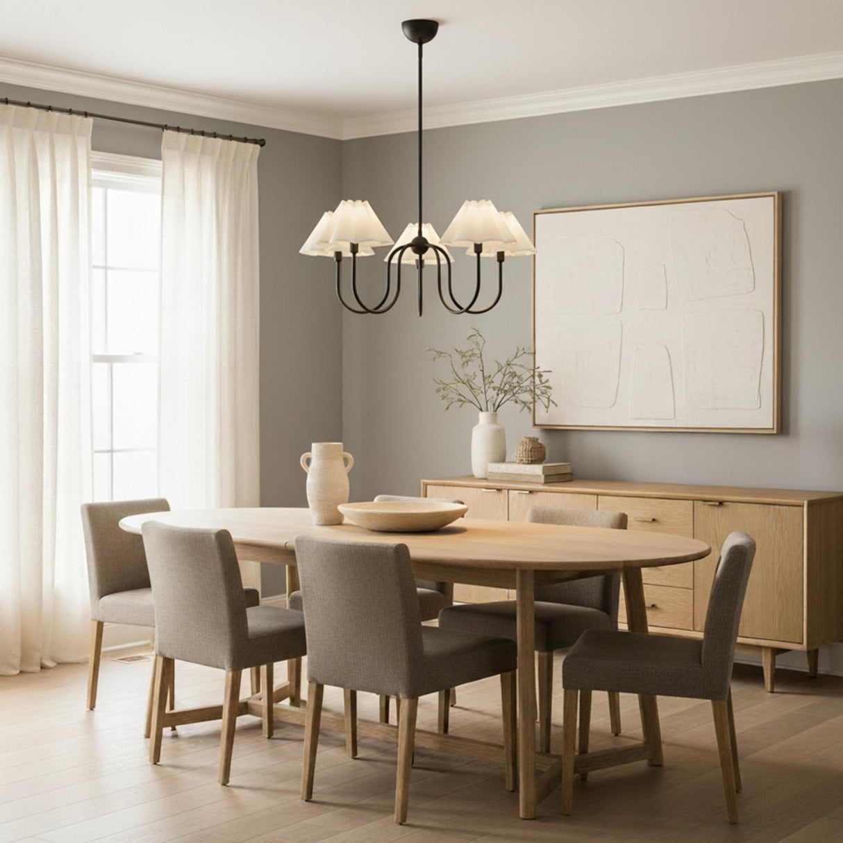 Rory 5 Light Chandelier 31, Matte Black styled in a Modern Dining Room with wood floors and neutral walls.