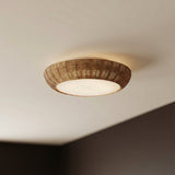 Miramar Flush Mount 15", Rattan and Opal Glass Natural woven flush mount in a Coastal Living Room with a dark accent wall.