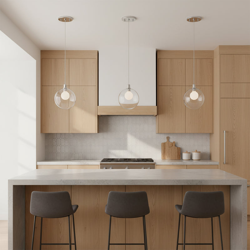 Soren LED Pendant 5, Chrome and Clear Glass - Three clear glass pendant lights above kitchen island