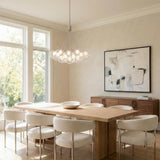 Soren 19 Light LED Chandelier 28", Chrome and Clear Glass globe Chandelier in a Contemporary Dining Room with a light oak table.