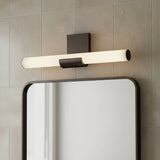 Nell LED Vanity Light 20, Urban Bronze - Modern vanity light with a horizontal frosted glass tube illuminated by LEDs, mounted above a rounded rectangular mirror with a dark bronze frame.