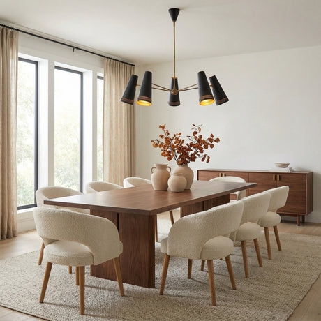 Darien 5 Light Chandelier 45", Matte Black with Hazelnut Leather geometric Chandelier in a Mid-Century Dining Room with a wooden dining table & bouclé chairs.