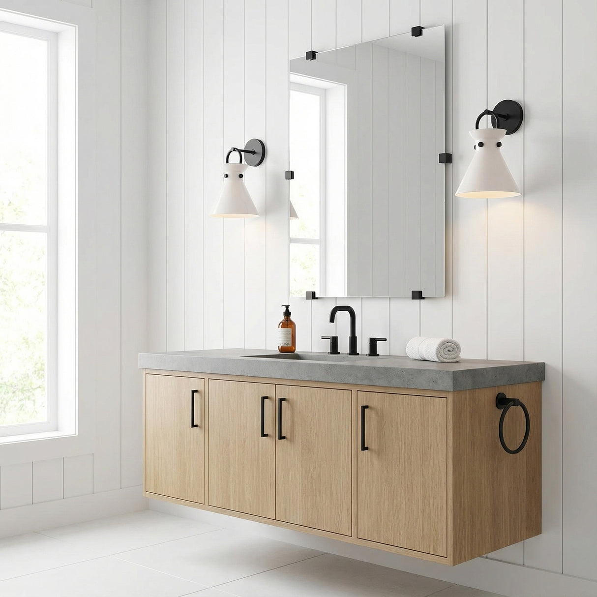 Aris Wall Sconce 13", Matte Black and Milk Glass geometric wall sconce in a Modern Farmhouse Bathroom with a floating wood vanity.