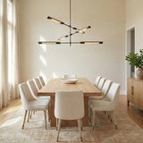 Linden 6 Light LED Chandelier 42", Urban Bronze linear chandelier in a Contemporary Dining Room with a light oak table and cream chairs.