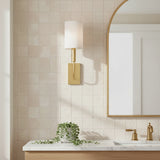 Thayer Wall Sconce 14", Modern Brass for Transitional home with Warm Beige Tile