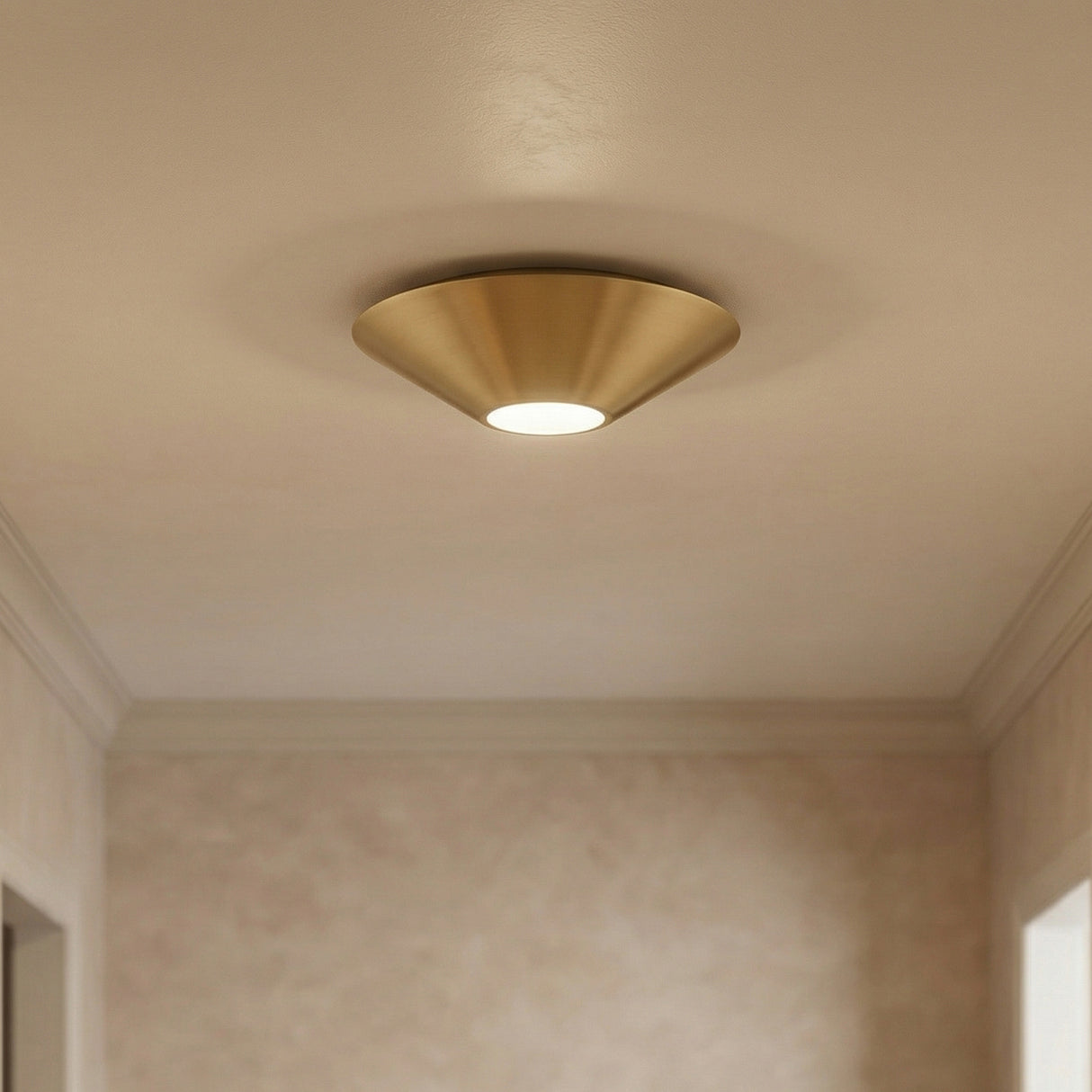 Belvin LED Flush Mount 12", Modern Brass in a Modern entryway with textured walls.